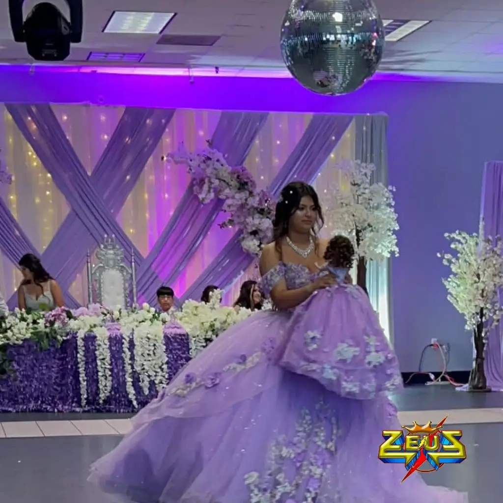 Beautiful quinceañera dancing at her XV años celebration with elegant lighting, DJ entertainment, LED effects, and luxury party setup in Columbus, Indiana.